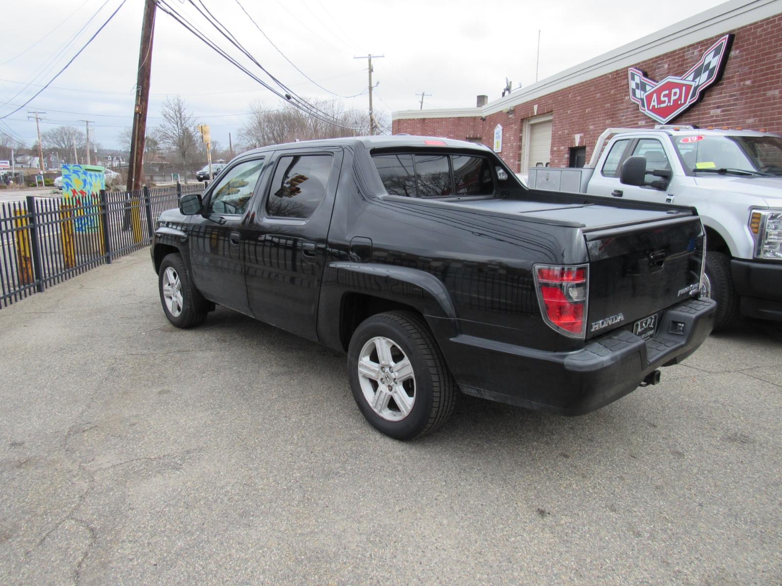 2012 BLACK /Gray Honda Ridgeline RTL (5FPYK1F56CB) , Automatic transmission, located at 215 Milton St, Dedham, MA, 02026, (781) 329-5144, 42.241905, -71.157295 - This nice Ridgeline is in excellent condition. Runs like new. All ASPI Motor Cars vehicles are fully serviced before they are delivered to assure the highest quality used vehicles. Comes with a 3/3 warranty included in the price. call for details. Prices on all vehicles do not include $299.95 Doc - Photo #2